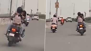 Delhi Couple Romance on Bike Video: Police Impose Rs 11,000 Fine After Clip of Couple Engaging in PDA on Moving Motorcycle Goes Viral