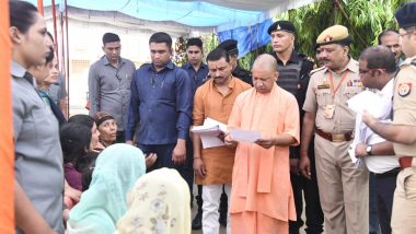 Uttar Pradesh CM Yogi Adityanath Hears Grievances of People, Asks Officials To Ensure Benefits of Welfare Schemes Reach Poor (See Pics)