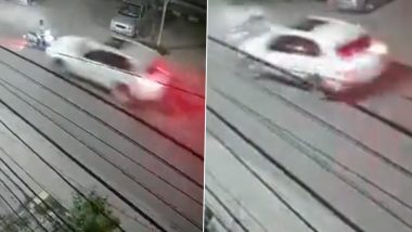 Telangana Hit-And-Run Video: Speeding BMW Rams Into GHMC Employee's Bike After Losing Control in Hyderabad; Terrifying CCTV Footage Surfaces