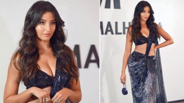 Nora Fatehi Attends Manish Malhotra's Fashion Show in Shimmery Saree Gown With Plunging Neckline (View Pics)