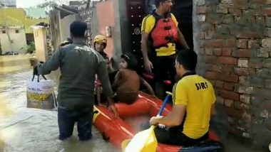 Uttarakhand Flood: SDRF Personnel Rescue Girl Whose House Submerged in Floodwater in Haridwar Village (Watch Video)