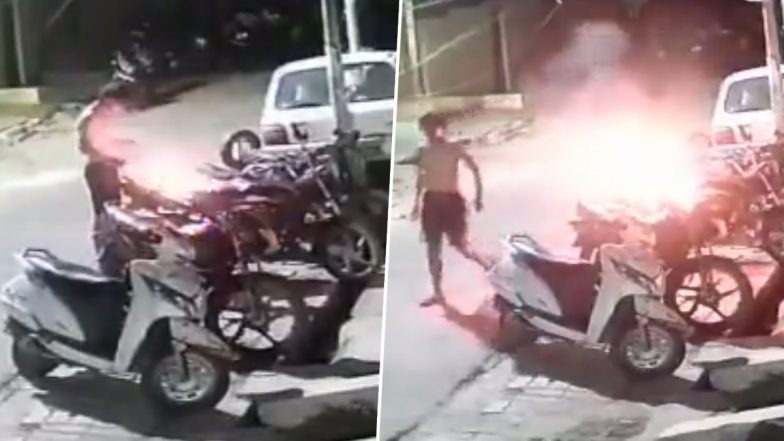 Uttar Pradesh Shocker: Youth Sets Bike Ablaze by Pouring Petrol and Throwing Burning Cigarette on It in Kanpur, Case Registered After Video Surfaces