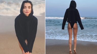 Amy Jackson Shares Stunning Aesthetic Shots From the Beach in Black Bikini Bottom and Hoodie (View Pics)