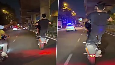 Delhi Bike Stunt Video: Youth Performs Wheelie on Two-Wheeler As He Goes By Police Car