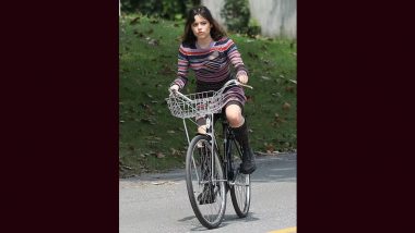 Beetlejuice 2 Set Photo Leaked! Jenna Ortega Rides Bicycle in Ripped Dress While Filming for Tim Burton’s Next (View Pic)