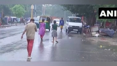 India News | Delhi Gets Season's First Heavy Rain, Several Areas Waterlogged, People Battle Traffic Woes