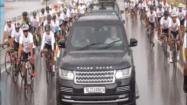 India News | PM Modi Holds Road Show Accompanied by Cyclists in Rajasthan's Bikaner