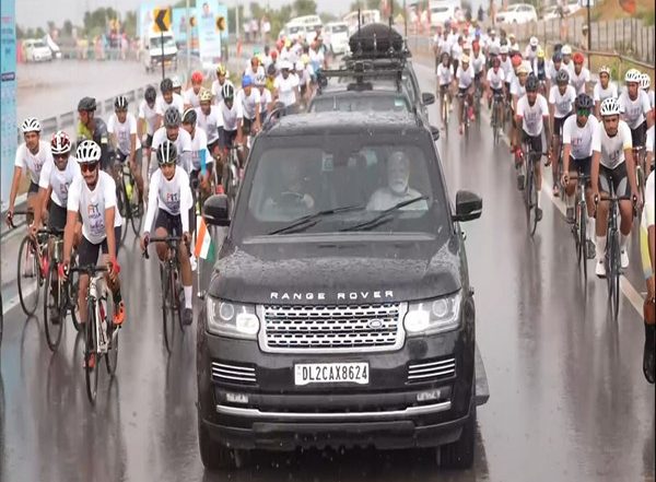 India News | PM Modi Holds Road Show Accompanied by Cyclists in Rajasthan's Bikaner