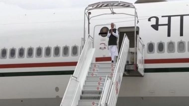 World News | PM Narendra Modi Arrives in France, Welcomed by French PM Elisabeth Borne at Paris Airport