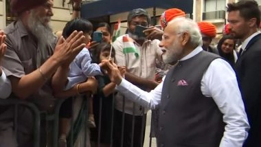 World News | Selfies, Slogans and Songs: PM Modi Receives a Rousing Welcome from Indian Diaspora in Paris