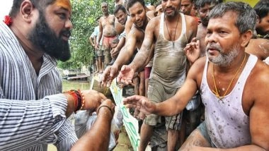 Sports News | Powerlifter-turned-shooter Gaurav Sharma Distributes Food Items to Flood-affected People in Delhi