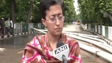 India News | Delhi Minister Atishi Inspects Flood-affected Area at Raj Ghat, Says Everyone is Working to Pump out Water