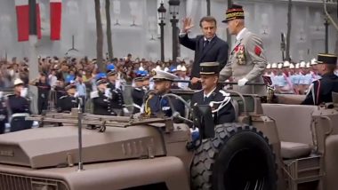 Bastille Day Parade 2023: French President Emmanuel Macron Waves at People Gathered To Witness Fete Nationale Francaise Parade in Paris (Watch Video)