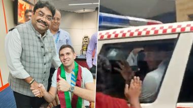 Argentina Footballer Emiliano Martinez Rescued in Police Vehicle After Excited Fans Damage His Car During Kolkata Tour (Watch Video)
