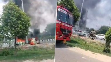 Car Catches Fire in Noida Video: Four-Wheeler Engulfed in Blaze on FNG Road After Facing Technical Problem During Trial for Service Checking