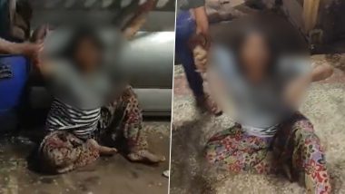 Woman Thrashed in Madhya Pradesh Video: Angry Mob Mercilessly Beats Woman on Suspicion of Theft in Sagar, Disturbing Clip Surfaces