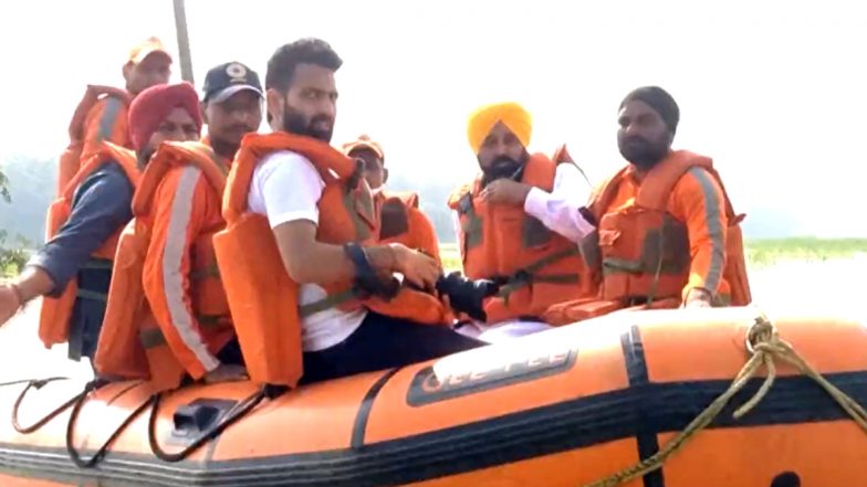 Punjab Floods: CM Bhagwant Mann Visits Flood-Hit Areas in Boat To Take Stock of Situation in Hoshiarpur District (Watch Video)
