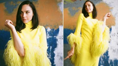 Gal Gadot Looks Vibrant in a Yellow Turtleneck Feathered Dress (See Pics)