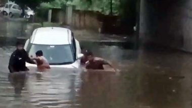 Chandigarh: Fire Team Rescues Couple From Drowning After Car Stuck in Water Under Railway Bridge at Industrial Area Phase-1 (Watch Video)