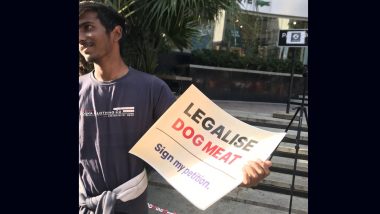 Bengaluru Man Holds Up a Placard Reading ‘Legalise Dog Meat’, Netizens Call It 'Disgusting' As the Pic Goes Viral (View)