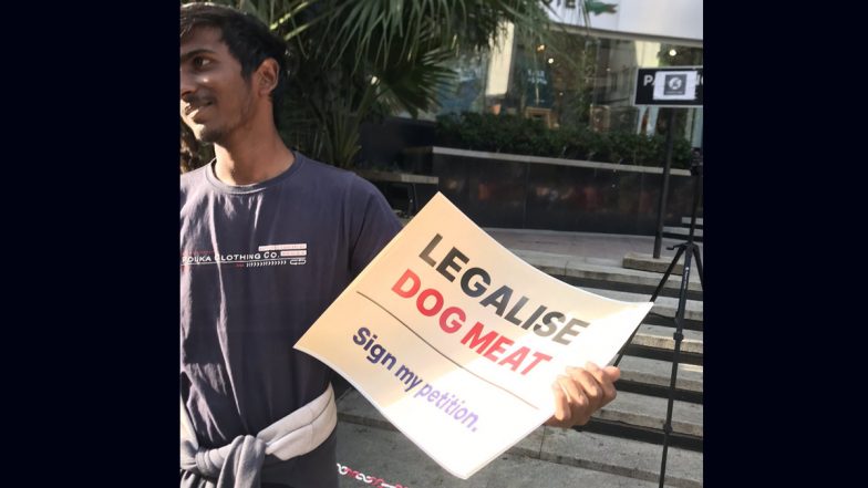 Bengaluru Man Holds Up a Placard Reading ‘Legalise Dog Meat’, Netizens Call It 'Disgusting' As the Pic Goes Viral (View)