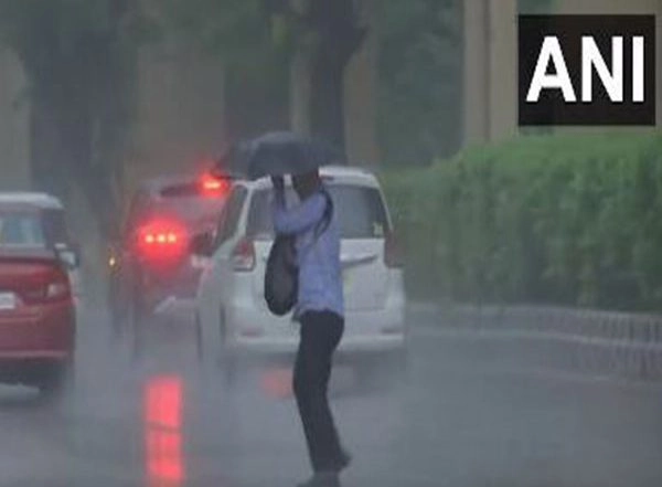 India News | Heavy Rain Lashes Parts of Delhi; More Rains Likely