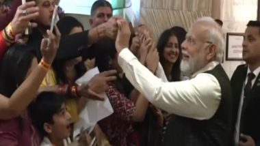 World News | South Africa: PM Modi Greets Members of Indian Diaspora Gathered in Johannesburg Hotel