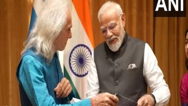 World News | PM Modi Meets Greek Researcher and Musician Konstantinos Kalaitzis in Athens