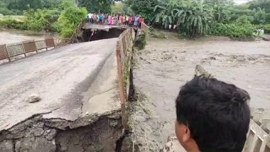 India News | Assam: Part of Bridge over Kalanadi River Collapses in Tamulpur Following Heavy Rainfall 