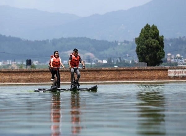 World News | “Water Bike” Craze Drives Tourists to Ancient City of Bhaktapur in Nepal