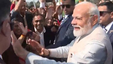 PM Modi in South Africa Video: Prime Minister Narendra Modi Greets Members of Indian Diaspora, Blesses Small Boy After Landing in Johannesburg for 15th BRICS Summit