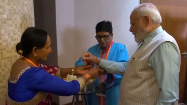 Raksha Bandhan With PM Modi: Arya Samaj South Africa President and Member of Indian Community Tie Rakhis to Prime Minister Narendra Modi in Johannesburg (Watch Video)