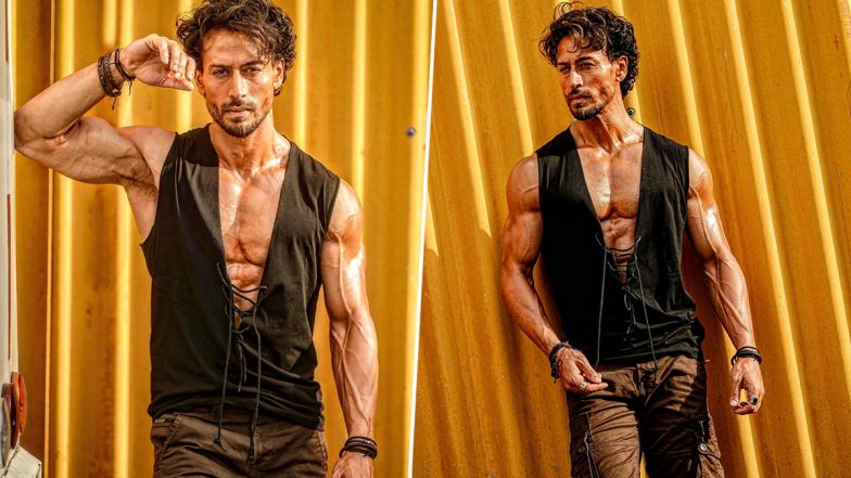 Tiger Shroff Flaunts His Chiselled Body in This Black Sleeveless Shirt! (View Pics)