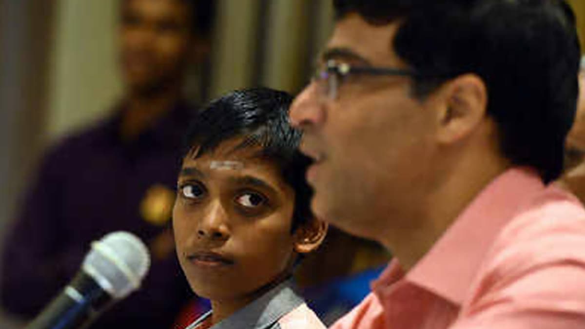 Rameshbabu Praggnanandhaa with Viswanathan Anand. Rameshbabu