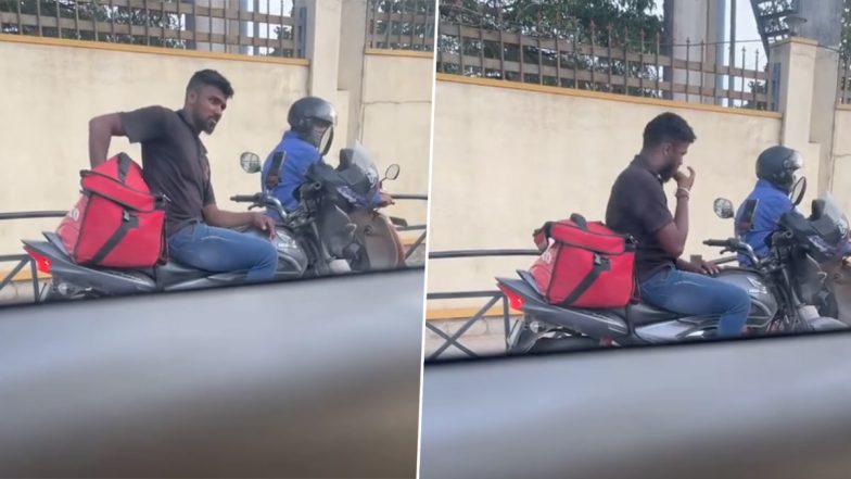 Zomato Executive Ate Customer's Food? Internet Left Divided After Video Shows Food Delivery Agent Eating Food From Bag at Traffic Signal in Bengaluru, Viral Clip Raises Safety Concerns