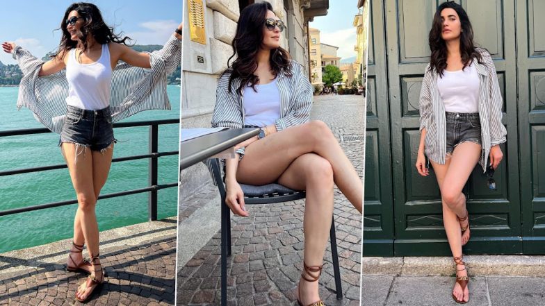Karishma Tanna Flaunts Toned Legs In Stylish Shorts Paired With Striped Shirt And Tank Top View