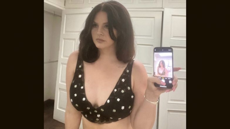 Lana Del Rey, 'Young And Beautiful' Singer, Stuns In A Ditsy White And Black Bralette (View Pic)