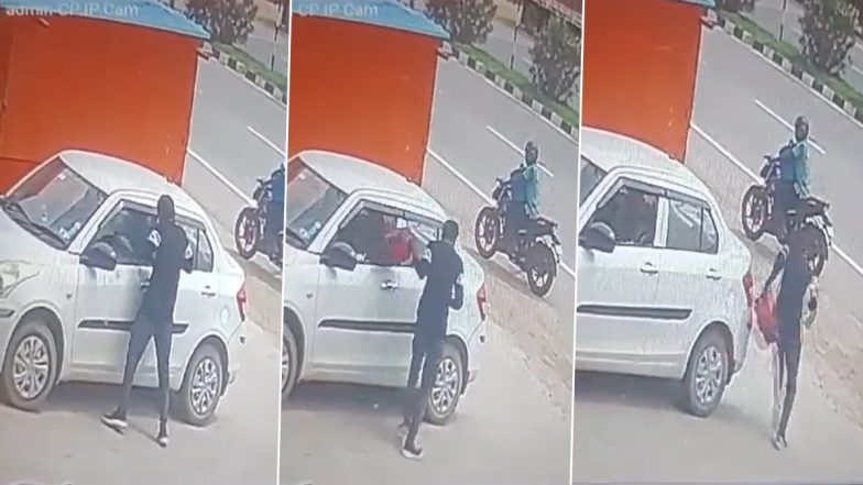 Robbery Caught on Camera in Telangana: Man Smashes Window of Parked Car, Flees With Bag of Cash in Nalgonda (Watch Video)