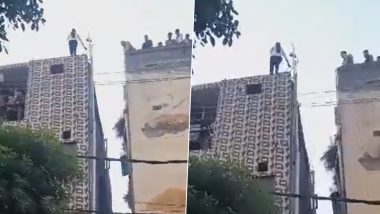 Ghaziabad Suicide Bid Video: Girl Climbs Terrace of Four-Storey Residential Building To Jump, Rescued