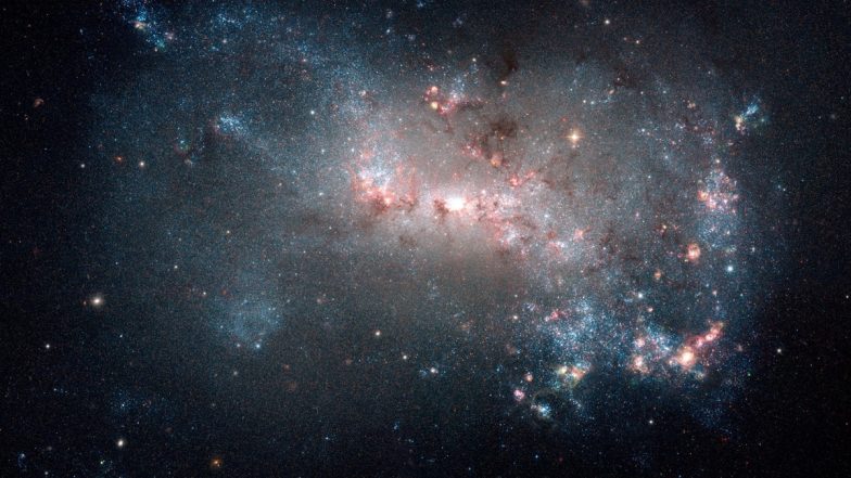 Galaxy NGC 4449 Image: NASA Shares Mesmerising Visual of 'Starburst' Located 12.5 Million Light Years Away From Earth (See Pic)