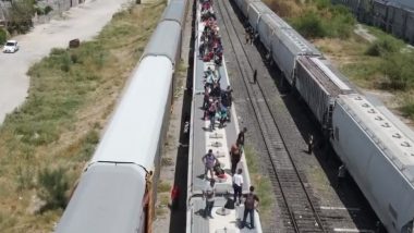 Texas: Shocking Video Shows Huge Number of Migrants on Top of Trains, Waving Venezuelan Flag and Crossing US Border in Eagle Pass