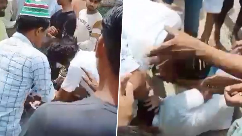 Uttar Pradesh Shocker: Angry Mob Thrash Man on Suspicion of Child Theft in Amroha, Disturbing Video Goes Viral