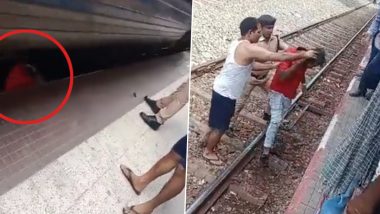 Bihar: Man Trying To Board Moving Train Falls on Railway Track at Bagaha Station, Narrowly Escapes Death As Train Passes Over Him (Watch Video)