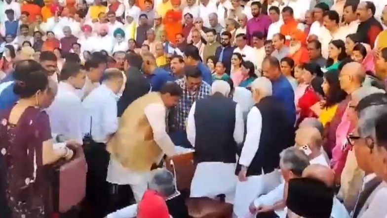 BJP MP Narhari Amin Faints During Group Photo Session at Parliament (Watch Video)