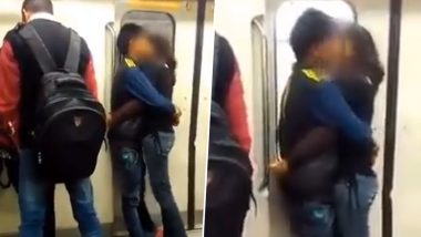 Delhi Metro Couple Kissing Video: Viral Clip Shows Couple Hugging and Kissing in Moving Train, Netizens React Angrily