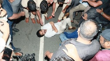 India News | JSP Chief Pawan Kalyan Lies Down on Road After Being Stopped at Andhra Border