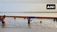 India News | Uttar Pradesh: Devotees Take Holy Dip in Sangam on Ganesh Chaturthi