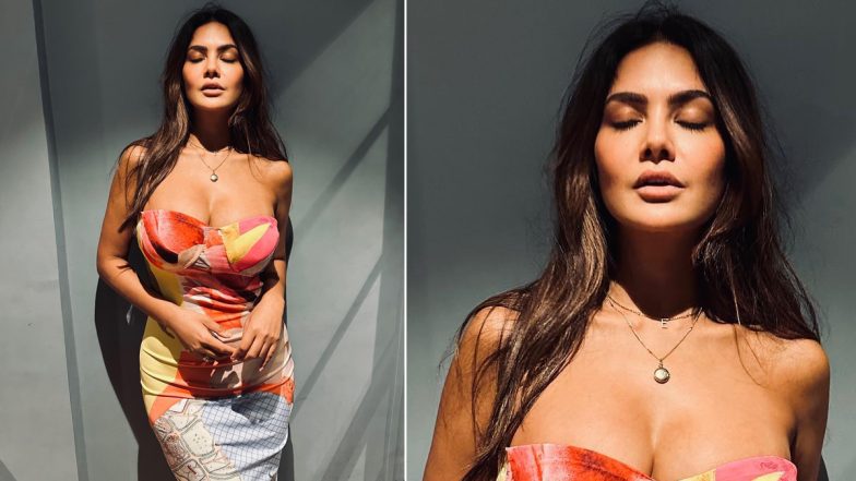 Esha Gupta Flaunts Her Picture Perfect Hourglass Physique In A Strapless Multi Colored Dress