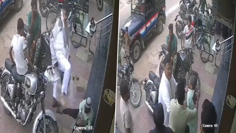 Uttar Pradesh Horror: Man Kicks and Slaps Minor Boy in Broad Daylight in Front of Police Jeep in Kanpur, Arrested (Watch Video)