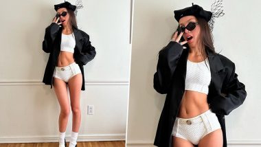 Olivia Rodrigo Stuns in White Bralette and Bummer Shorts Paired With an Oversized Coat (View Pic)